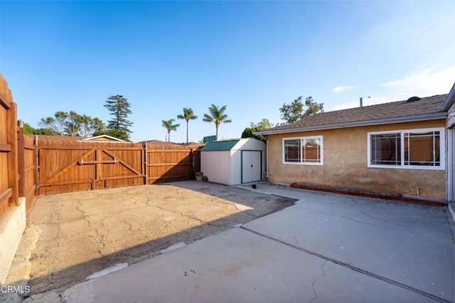 view of patio with a shed