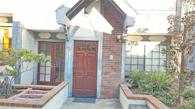 view of exterior entry with french doors