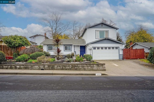 view of front of property with a garage