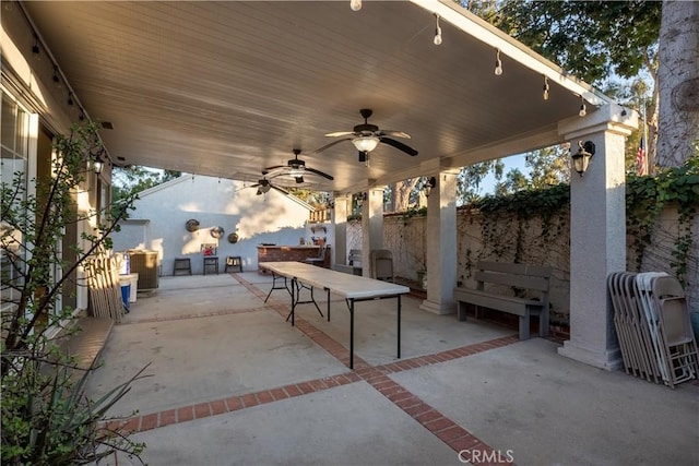 view of patio with ceiling fan