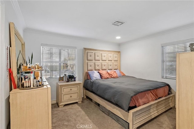 carpeted bedroom featuring ornamental molding