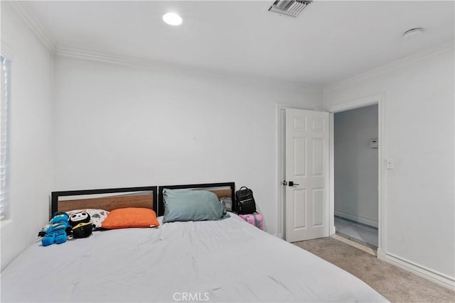 carpeted bedroom featuring ornamental molding