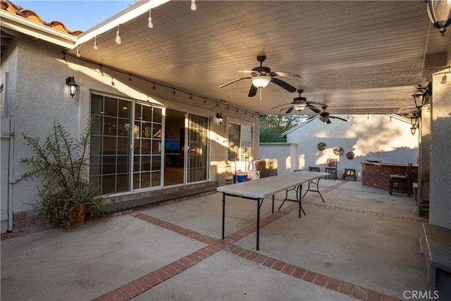 view of patio with ceiling fan