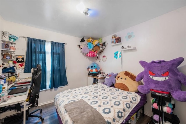 bedroom featuring hardwood / wood-style floors