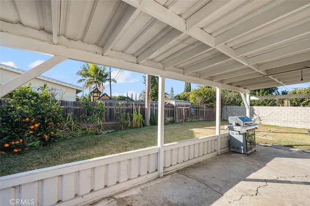 view of patio featuring a grill