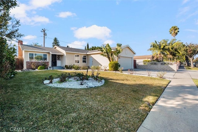 ranch-style house featuring a front lawn and a garage