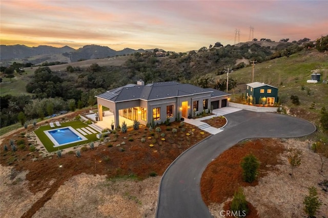 exterior space featuring a mountain view