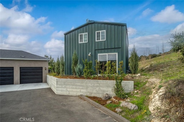 view of home's exterior featuring a garage