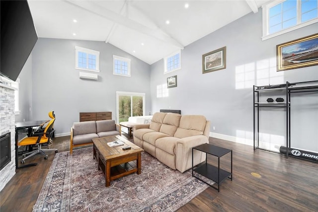 living room with dark hardwood / wood-style flooring, a towering ceiling, and a fireplace