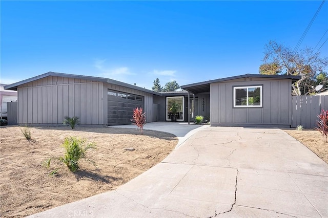 ranch-style house featuring a garage