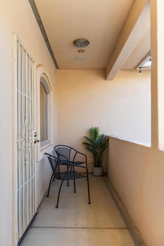 balcony featuring french doors