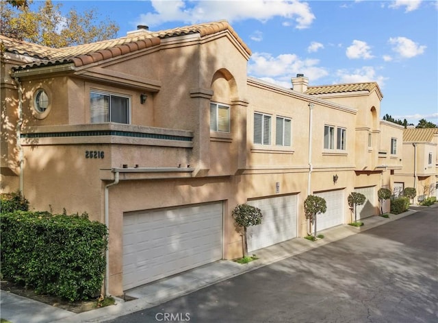 exterior space with a garage