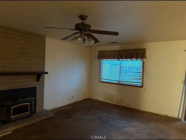 unfurnished living room with ceiling fan