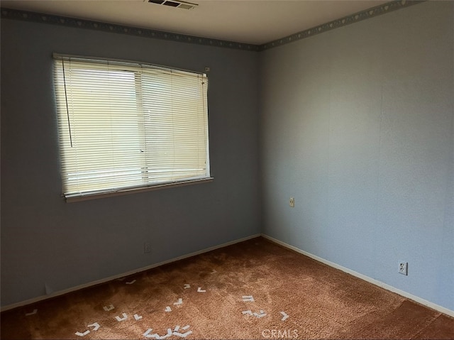 unfurnished room featuring carpet floors