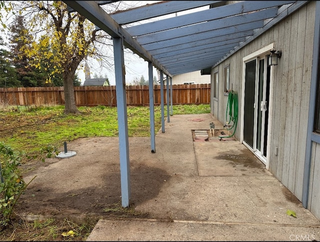 view of patio featuring a pergola