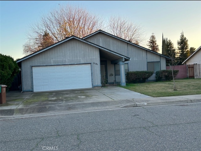 single story home featuring a yard