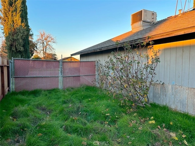 view of yard with central air condition unit