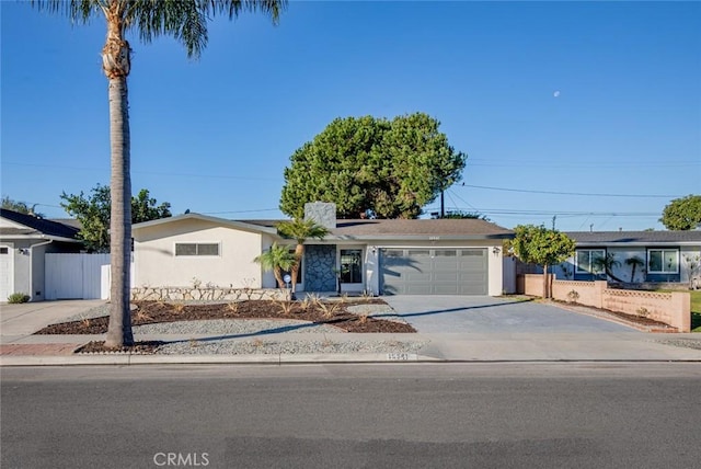 single story home with a garage