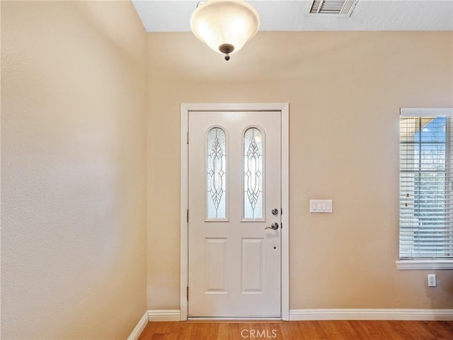 foyer entrance featuring light wood-type flooring