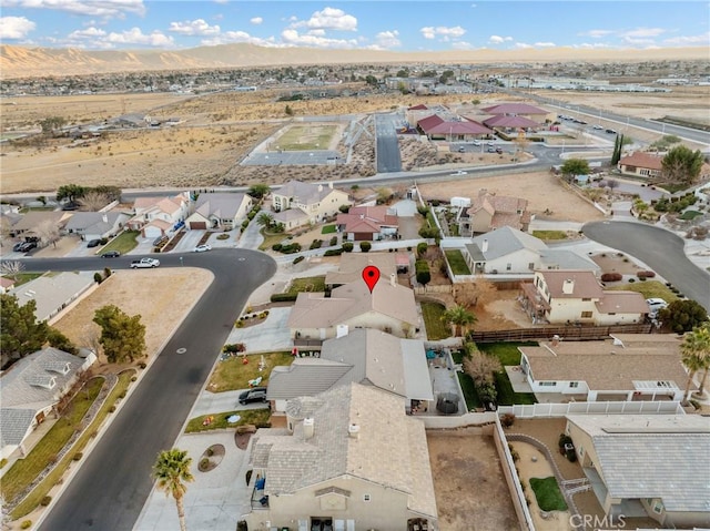 drone / aerial view featuring a mountain view