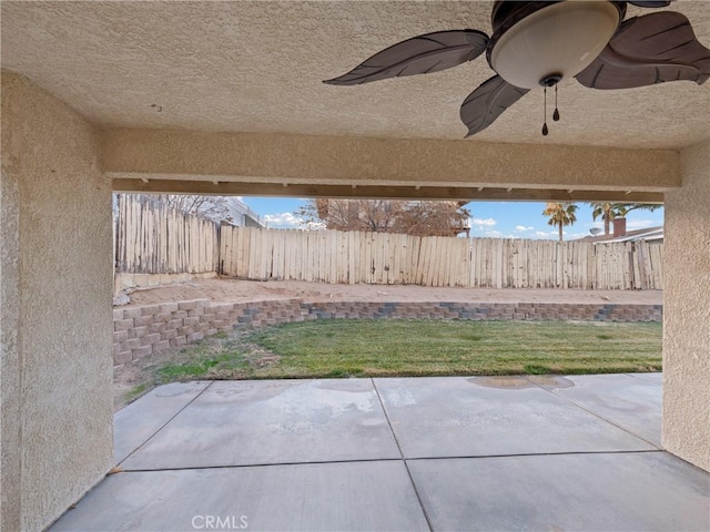 view of patio with ceiling fan