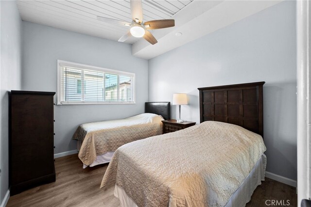 bedroom featuring ceiling fan, hardwood / wood-style floors, and wooden ceiling