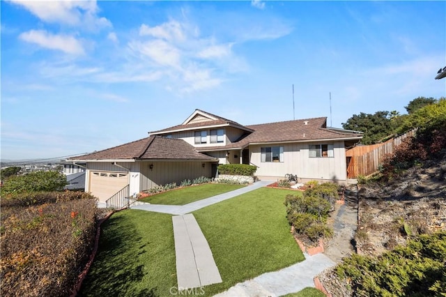 view of front of home with a front lawn