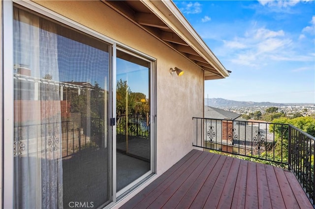 balcony featuring a mountain view