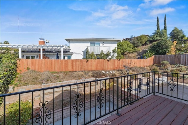 wooden terrace featuring a pergola