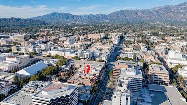 birds eye view of property featuring a mountain view