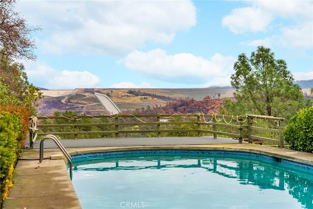 view of pool featuring a mountain view