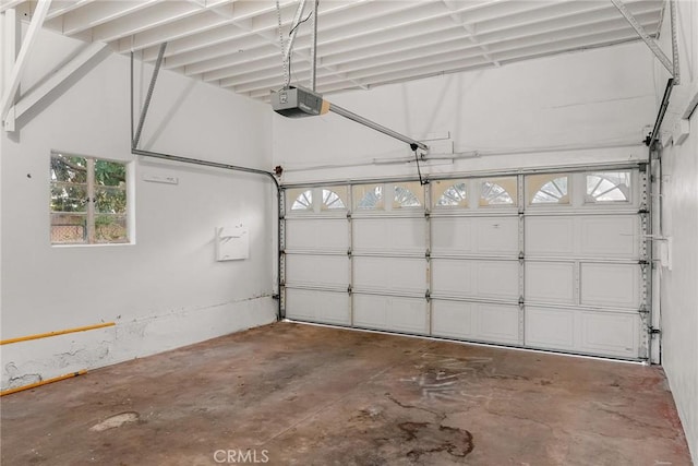 garage featuring a garage door opener