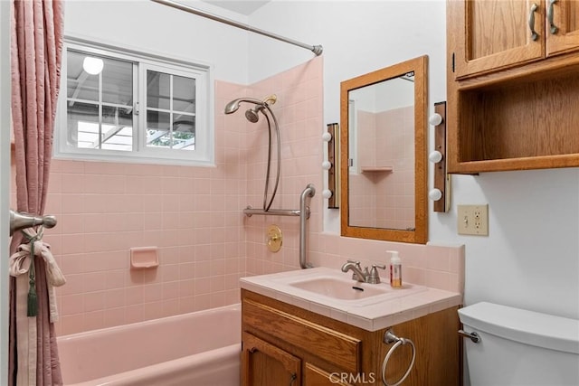 full bathroom featuring vanity, toilet, and shower / bath combo with shower curtain