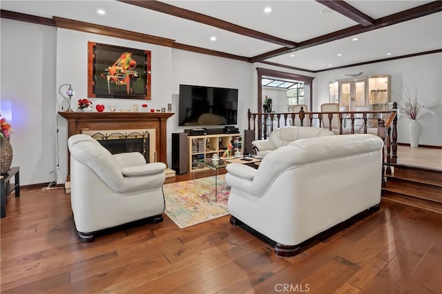 living area with crown molding, beamed ceiling, recessed lighting, and wood-type flooring