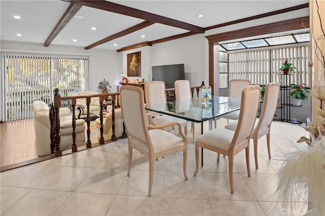 dining space featuring light tile patterned floors, beamed ceiling, and recessed lighting