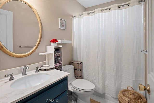 bathroom with toilet, shower / bath combo, and vanity