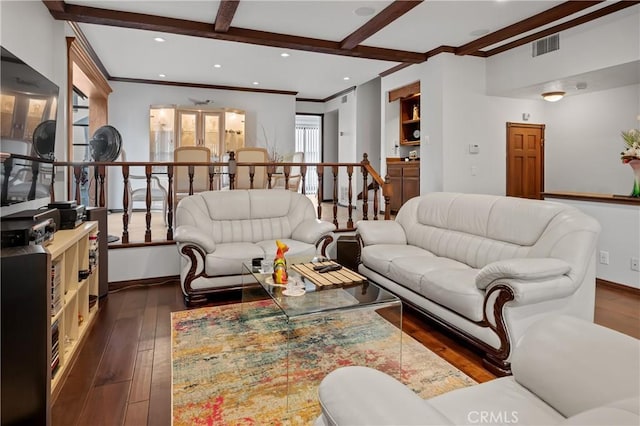 living room with dark wood-type flooring and beam ceiling