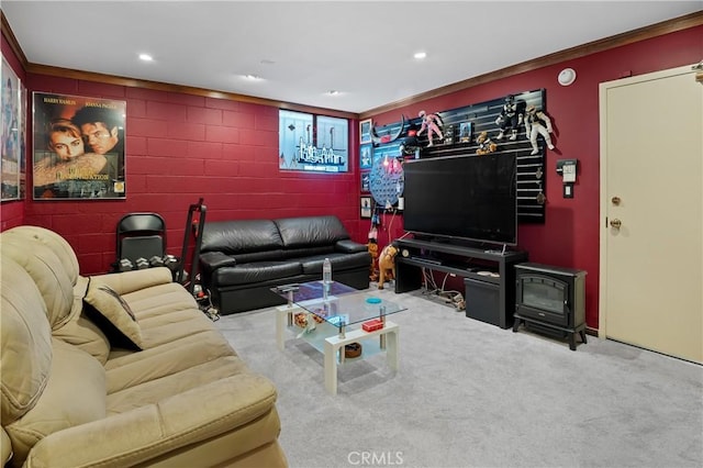 carpeted living room featuring recessed lighting, ornamental molding, and a wood stove