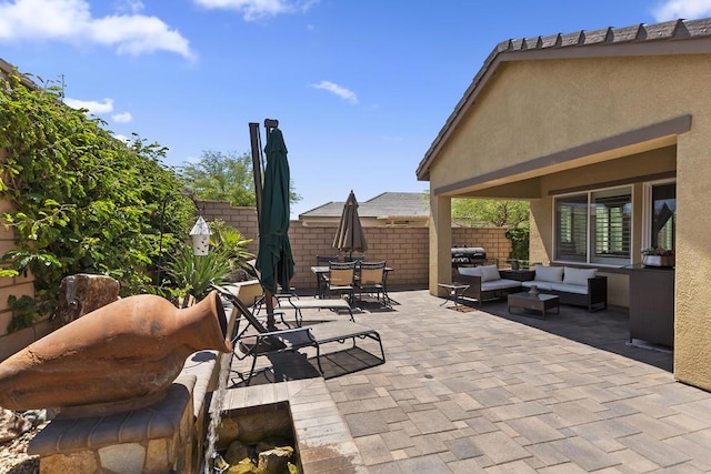 view of patio with an outdoor living space