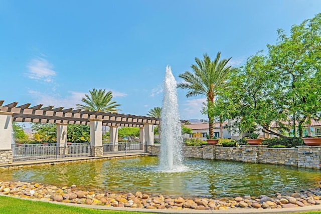 view of home's community with a water view