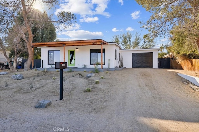 view of front of home with a garage