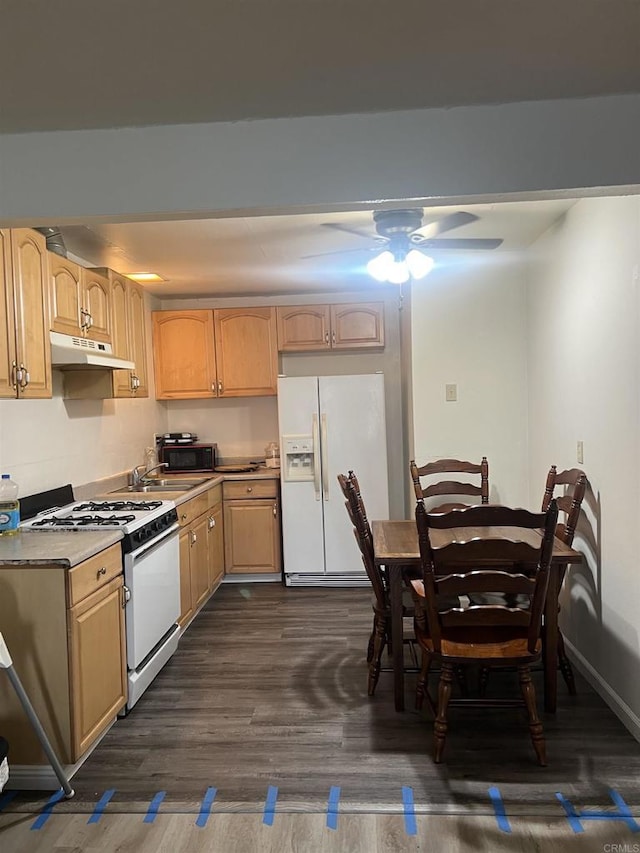 kitchen featuring light brown cabinetry, white appliances, dark hardwood / wood-style flooring, and ceiling fan