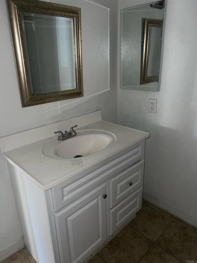 bathroom with vanity and tile patterned floors