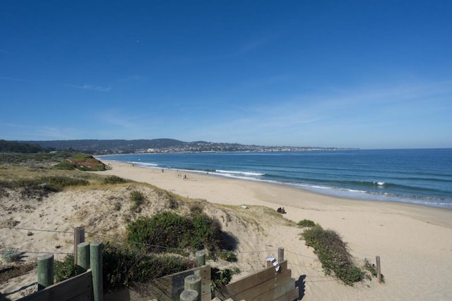 property view of water featuring a view of the beach