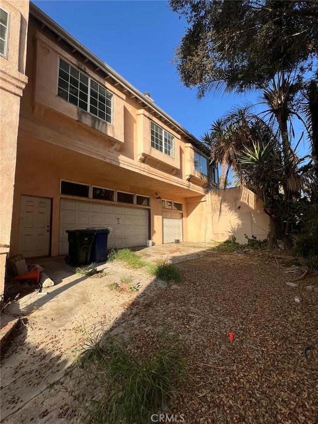 exterior space featuring a garage