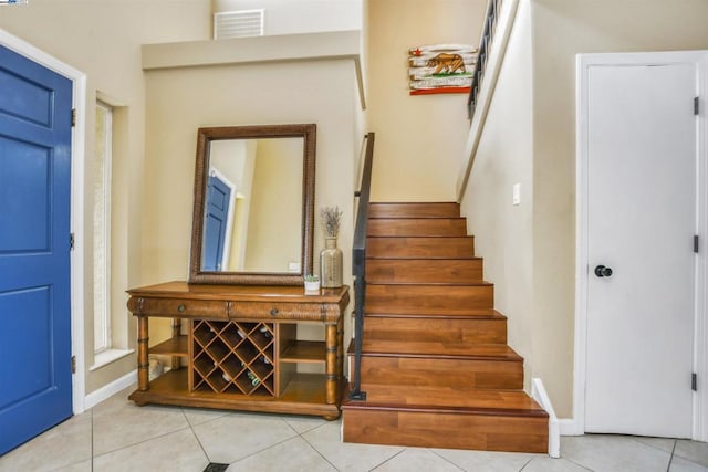 entrance foyer with light tile patterned flooring