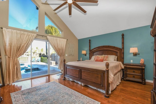 bedroom featuring ceiling fan, access to exterior, dark hardwood / wood-style floors, and high vaulted ceiling