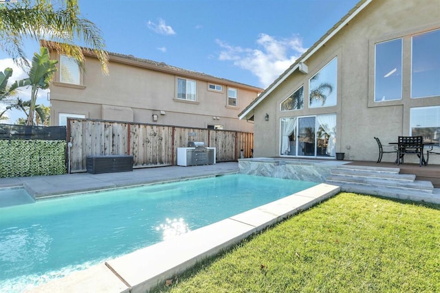 view of pool with a lawn