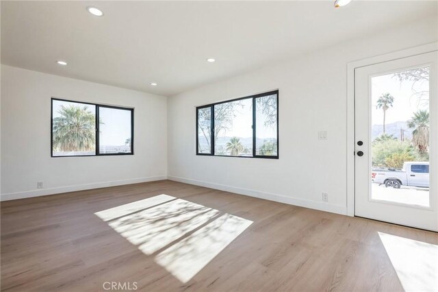 interior space with light hardwood / wood-style floors