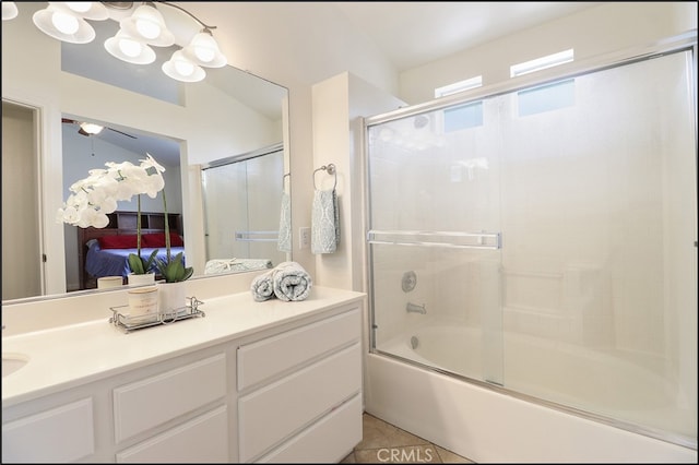 bathroom with shower / bath combination with glass door, tile patterned floors, and ceiling fan